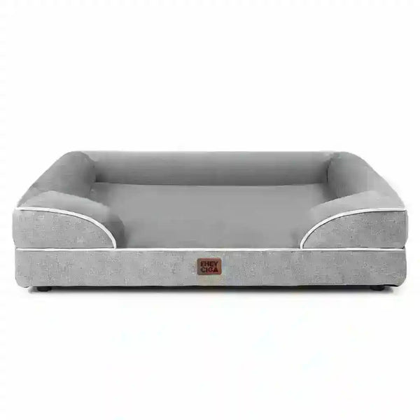 Gray dog bed with white trim and supportive sides for comfortable pet resting1