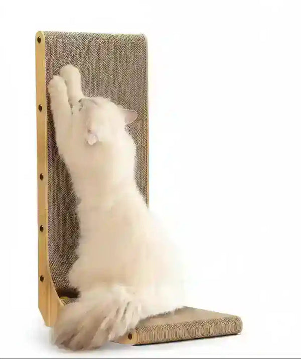 Fluffy white cat scratching on a wooden cat scratching post with cardboard surface1