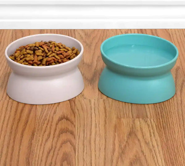 Elevated pet bowls for food and water, ideal for cats and dogs, placed on wooden floor4