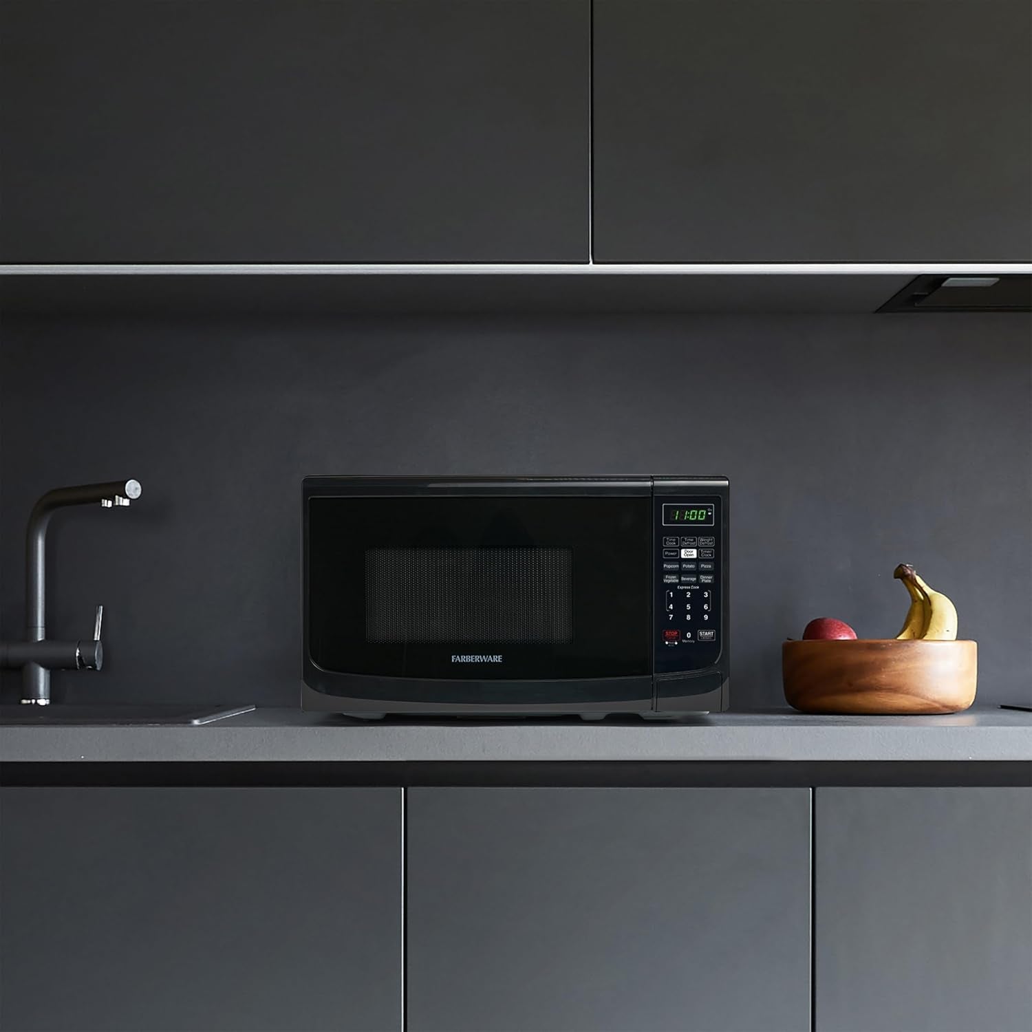 0-7-cu-ft-countertop-microwave-oven-700-watts-power-auto-cook-settings-defrost-easy-clean-and-child-safety-lock-black