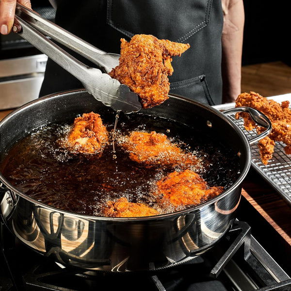 Hexclad Hybrid Nonstick 18-Piece Cookware Set, 2, 3, and 8Qt Pots with Lids, 2 Silicone Trivets, 8", 10", and 12" Pans with Lids, 7Qt Chicken Fryer with Lid, and 14" Wok with Lid, Stay-Cool Handles4