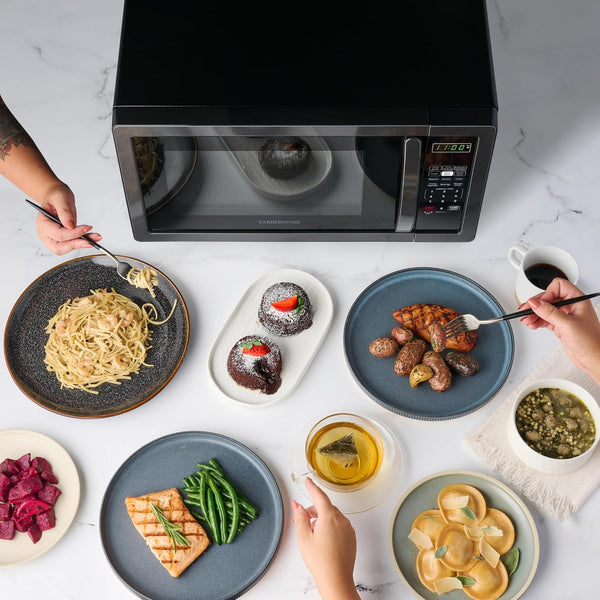 1.1 Cu. Ft. Countertop Microwave Oven – 1000 Watts Power, Auto Cook Settings, Defrost, Easy Clean and Child Safety Lock - Stainless and Black6