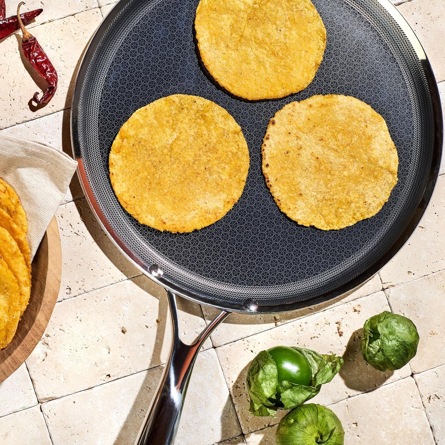 hexclad-hybrid-nonstick-4-piece-cookware-set-14-wok-with-lid-12-griddle-and-10-pan-stay-cool-handles-dishwasher-and-oven-safe-induction-ready-compatible-with-all-cooktops