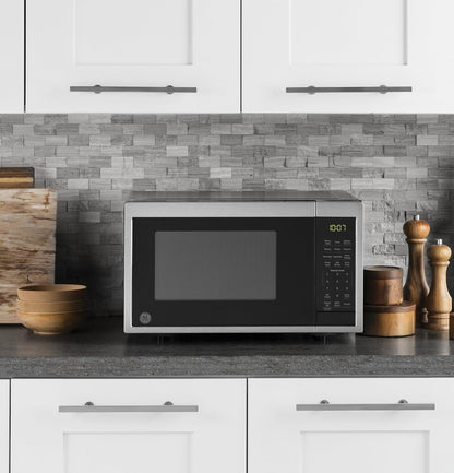 GE Countertop Microwave Oven | 0.9 Cubic Feet Capacity, 900 Watts | Kitchen Essentials for the Countertop or Dorm Room | Stainless Steel8